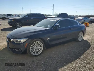 2015 BMW 4 Series 428i with VIN WBA3N3C56FK232040, listed as a Copart auction lot 49974885 with 48,450 mi miles and Salvage Title. Bid and sale history available at carsss.com. Image 1.