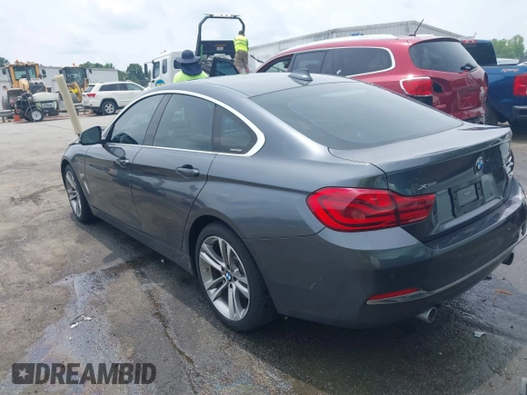 2019 BMW 4 Series 440i xDrive with VIN WBA4J7C5XKBM75920, listed as a IAAI auction lot 42481184 with 101,887 mi miles and . Bid and sale history available at DreamBid. Image 3.
