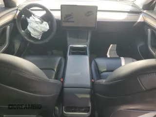 2023 Tesla Model 3 with VIN 5YJ3E1EA8PF394705, listed as a Copart auction lot 52319945 with 58,193 mi miles and Salvage title. Bid and sale history available at DreamBid. Image 8.