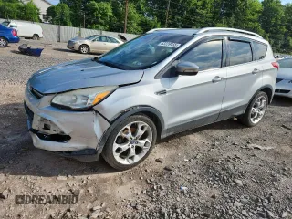 2015 Ford Escape Titanium with VIN 1FMCU0JX0FUA36135, listed as a Copart auction lot 63239455 with 222,569 mi miles and Salvage title. Bid and sale history available at DreamBid. Image 1.