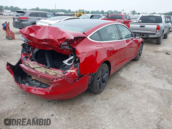2018 Tesla Model 3 Long Range Battery z VIN 5YJ3E1EB8JF119898, wystawiony jako IAAI lot #42297445 z przebiegiem 29 555 mil mil oraz . Historia ofert i sprzedaży dostępna na DreamBid. Obrazek 4.