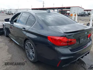 2017 BMW 5 Series 540i with VIN WBAJE5C35HG916844, listed as a IAAI auction lot 41793043 with 92,964 mi miles and . Bid and sale history available at carsss.com. Image 3.