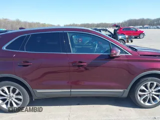 2016 Lincoln MKC Select z VIN 5LMCJ2C96GUJ00891, wystawiony jako IAAI lot #41962387 z przebiegiem 173 999 mil mil oraz . Historia ofert i sprzedaży dostępna na DreamBid. Obrazek 14.