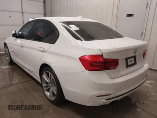 2016 BMW 3 Series 328i with VIN WBA8E9G5XGNT85247, listed as a IAAI auction lot 41578238 with 64,951 mi miles. Bid and sale history available at carsss.com. Image 3.