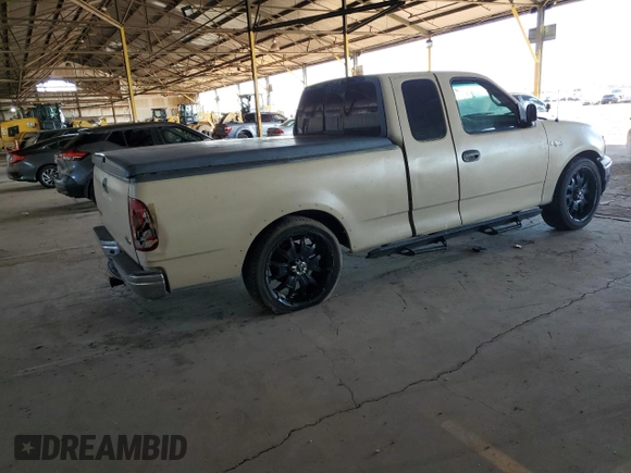 1999 Ford F-150 with VIN 1FTZX172XXKA26359, listed as a Copart auction lot 52215805 with 268,403 mi miles and Salvage title. Bid and sale history available at DreamBid. Image 3.