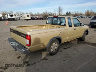 1998 Nissan Frontier XE z VIN 1N6DD26S4WC369815, wystawiony jako Copart lot #42092495 z przebiegiem Nie podano mil oraz Szkoda całkowita • Salvage title. Historia ofert i sprzedaży dostępna na DreamBid. Obrazek 3.