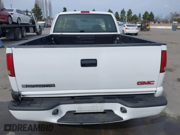 2003 GMC Sonoma SLS z VIN 1GTCS19X438272277, wystawiony jako IAAI lot #41554041 z przebiegiem 168 682 mil mil oraz . Historia ofert i sprzedaży dostępna na DreamBid. Obrazek 16.