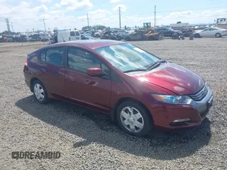 2011 Honda Insight LX z VIN JHMZE2H51BS004312, wystawiony jako IAAI lot #42086422 z przebiegiem 72 814 mil mil oraz . Historia ofert i sprzedaży dostępna na DreamBid. Obrazek 1.
