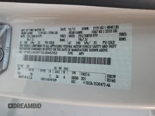 2016 Ford Escape SE z VIN 1FMCU9G97GUB45352, wystawiony jako Copart lot #60001055 z przebiegiem 93 685 mil mil oraz Szkoda całkowita • Salvage title. Historia ofert i sprzedaży dostępna na DreamBid. Obrazek 13.