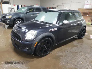 2007 MINI Hardtop S with VIN WMWMF73547TL90560, listed as a Copart auction lot 42565685 with 57,066 mi miles and Salvage Title. Bid and sale history available at DreamBid. Image 1.