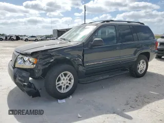 2004 Jeep Grand Cherokee Laredo z VIN 1J4GX48N14C333288, wystawiony jako Copart lot #55102145 z przebiegiem 239 593 mil mil oraz Nie do naprawy • Non repairable. Historia ofert i sprzedaży dostępna na DreamBid. Obrazek 1.