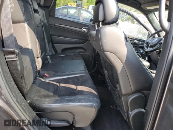 2018 Jeep Grand Cherokee Altitude with VIN 1C4RJEAG4JC145023, listed as a Copart auction lot 59001735 with 127,627 mi miles and Salvage title. Bid and sale history available at DreamBid. Image 11.