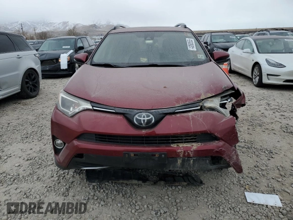 2018 Toyota RAV4 XLE with VIN JTMRFREV7JD252112, listed as a Copart auction lot 43088555 with 77,509 mi miles and Salvage Title. Bid and sale history available at carsss.com. Image 5.