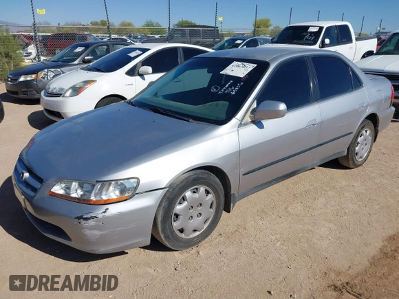 1999 Honda Accord LX z VIN JHMCG5648XC803856, wystawiony jako IAAI lot #42063037 z przebiegiem 254 421 mil mil oraz . Historia ofert i sprzedaży dostępna na DreamBid. Obrazek 2.