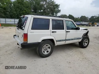 2001 Jeep Cherokee Sport with VIN 1J4FF48S31L520760, listed as a Copart auction lot 59807625 with 298,489 mi miles and Salvage title. Bid and sale history available at DreamBid. Image 3.