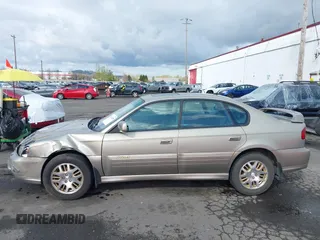 2003 Subaru Legacy Outback with VIN 4S3BE896237206173, listed as a IAAI auction lot 41910050 with 143,056 mi miles and . Bid and sale history available at DreamBid. Image 14.