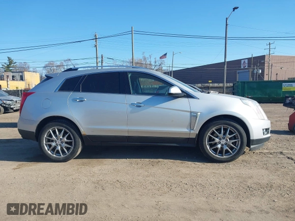 2013 Cadillac SRX Performance Collection z VIN 3GYFNHE33DS540108, wystawiony jako IAAI lot #42061957 z przebiegiem 182 797 mil mil oraz . Historia ofert i sprzedaży dostępna na DreamBid. Obrazek 13.