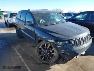2018 Jeep Grand Cherokee Laredo E with VIN 1C4RJFAGXJC147400, listed as a IAAI auction lot 41358662 with 97,184 mi miles. Bid and sale history available at carsss.com. Image 1.