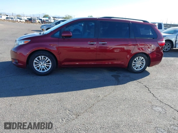 2015 Toyota Sienna XLE with VIN 5TDYK3DCXFS621190, listed as a IAAI auction lot 41646481 with 173,817 mi miles. Bid and sale history available at carsss.com. Image 14.