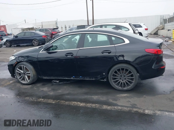 2021 BMW 2 Series 228i xDrive with VIN WBA73AK0XM7H43867, listed as a IAAI auction lot 41226556 with 30,767 mi miles and . Bid and sale history available at DreamBid. Image 14.
