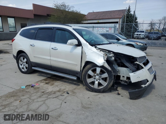 2012 Chevrolet Traverse LTZ z VIN 1GNKRLED5CJ197457, wystawiony jako Copart lot #54143415 z przebiegiem 225 609 mil mil oraz Szkoda całkowita • Salvage title. Historia ofert i sprzedaży dostępna na DreamBid. Obrazek 4.
