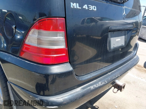 2000 Mercedes-Benz M 320/430/500 z VIN 4JGAB72E0YA203293, wystawiony jako IAAI lot #42257048 z przebiegiem 274 082 mil mil oraz . Historia ofert i sprzedaży dostępna na DreamBid. Obrazek 13.