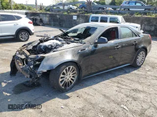 2011 Cadillac CTS Performance with VIN 1G6DK5ED8B0152456, listed as a Copart auction lot 71182634 with Not Provided miles and Salvage Title. Bid and sale history available at DreamBid. Image 1.