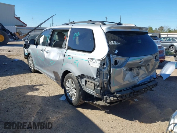 2014 Toyota Sienna XLE with VIN 5TDYK3DC7ES447903, listed as a IAAI auction lot 41835665 with 224,492 mi miles. Bid and sale history available at carsss.com. Image 3.