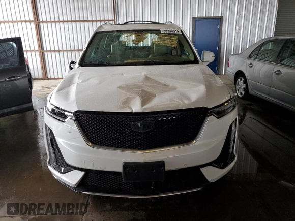 2021 Cadillac XT6 AWD Sport z VIN 1GYKPHRSXMZ195978, wystawiony jako Copart lot #80886314 z przebiegiem Nie podano mil oraz Szkoda całkowita • Salvage title. Historia ofert i sprzedaży dostępna na DreamBid. Obrazek 5.