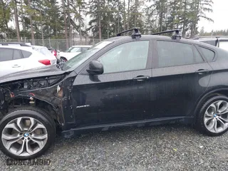 2014 BMW X6 50i with VIN 5UXFG8C57EL593257, listed as a IAAI auction lot 41655486 with 128,292 mi miles. Bid and sale history available at carsss.com. Image 15.