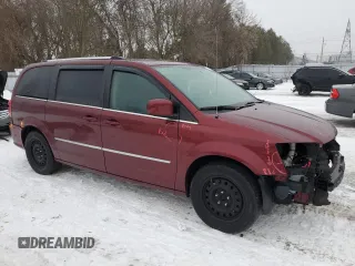 2017 Dodge Grand Caravan Crew Plus with VIN 2C4RDGDG9HR754866, listed as a Copart auction lot 42341225 with 213,458 mi miles and Salvage Title. Bid and sale history available at DreamBid. Image 4.