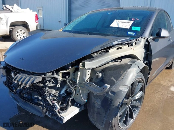 2018 Tesla Model 3 Long Range Battery with VIN 5YJ3E1EA8JF010834, listed as a IAAI auction lot 41598099 with 83,252 mi miles. Bid and sale history available at carsss.com. Image 6.