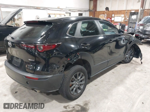 2021 Mazda CX-30 S with VIN 3MVDMBAL0MM226504, listed as a IAAI auction lot 41619102 with 87,998 mi miles and . Bid and sale history available at carsss.com. Image 4.