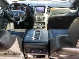 2018 GMC Yukon Denali with VIN 1GKS1CKJ4JR244135, listed as a Copart auction lot 71445964 with 148,375 mi miles and Salvage Title. Bid and sale history available at carsss.com. Image 8.