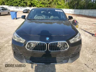 2022 BMW X2 sDrive28i z VIN WBXYH9C02N5U43355, wystawiony jako Copart lot #54235765 z przebiegiem 51 347 mil mil oraz Szkody całkowita. Historia ofert i sprzedaży dostępna na DreamBid. Obrazek 5.