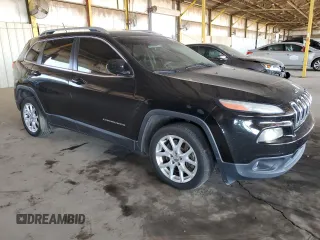 2018 Jeep Cherokee Latitude with VIN 1C4PJLCX6JD531185, listed as a Copart auction lot 61922815 with 246,133 mi miles and Salvage title. Bid and sale history available at DreamBid. Image 4.