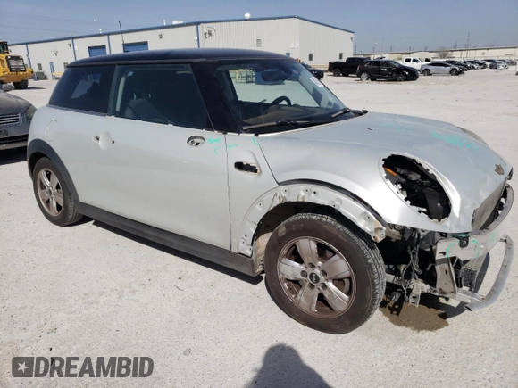 2017 MINI Hardtop Cooper with VIN WMWXP5C31H2F60901, listed as a Copart auction lot 49279985 with 75,749 mi miles and Clean title. Bid and sale history available at DreamBid. Image 4.