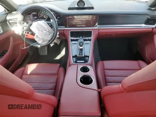 2023 Porsche Panamera z VIN WP0AJ2A79PL101328, wystawiony jako Copart lot #55093015 z przebiegiem 26 927 mil mil oraz Szkody całkowita. Historia ofert i sprzedaży dostępna na DreamBid. Obrazek 8.