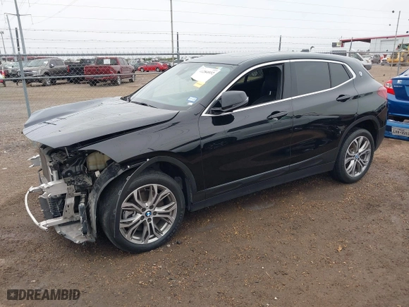 2022 BMW X2 xDrive28i with VIN WBXYJ1C01N5U20171, listed as a IAAI auction lot 41284932 with 64,256 mi miles. Bid and sale history available at carsss.com. Image 20.
