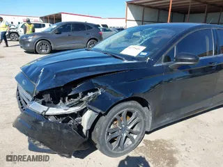 2018 Ford Fusion SE with VIN 3FA6P0H77JR180057, listed as a IAAI auction lot 41729451 with 122,200 mi miles. Bid and sale history available at carsss.com. Image 6.