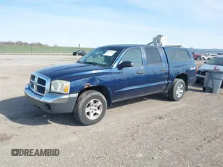 2005 Dodge Dakota SLT z VIN 1D7HW48N75S110229, wystawiony jako IAAI lot #41909362 z przebiegiem 193 812 mil mil oraz . Historia ofert i sprzedaży dostępna na DreamBid. Obrazek 2.
