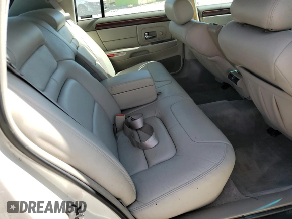 1999 Cadillac DeVille z VIN 1G6KD54YXXU794473, wystawiony jako Copart lot #79774804 z przebiegiem 44 601 mil mil oraz Czysty tytuł • Clean title. Historia ofert i sprzedaży dostępna na DreamBid. Obrazek 10.