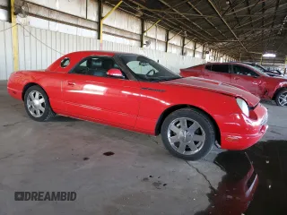 2002 Ford Thunderbird Hardtop Premium with VIN 1FAHP60A52Y117349, listed as a Copart auction lot 87468164 with 135,893 mi miles and Salvage Title. Bid and sale history available at DreamBid. Image 4.