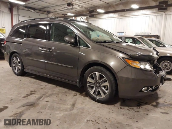 2016 Honda Odyssey Touring Elite with VIN 5FNRL5H92GB045824, listed as a IAAI auction lot 41872220 with 120,557 mi miles. Bid and sale history available at carsss.com. Image 1.