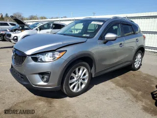 2014 Mazda CX-5 Grand Touring with VIN JM3KE4DY4E0305212, listed as a Copart auction lot 53145305 with 233,061 mi miles and Salvage Title. Bid and sale history available at carsss.com. Image 1.