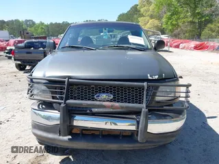 2003 Ford F-150 XL with VIN 1FTRF18243NB29920, listed as a IAAI auction lot 42037138 with 230,215 mi miles and . Bid and sale history available at DreamBid. Image 12.