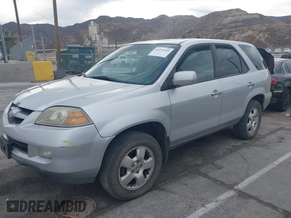 2006 Acura MDX with VIN 2HNYD18216H514134, listed as a IAAI auction lot 41233105 with 144,326 mi miles. Bid and sale history available at carsss.com. Image 2.