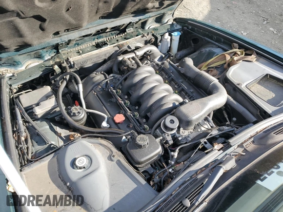 1998 Jaguar XJ with VIN SAJHX1241WC839104, listed as a Copart auction lot 81911744 with 61,956 mi miles and Clean title. Bid and sale history available at DreamBid. Image 11.