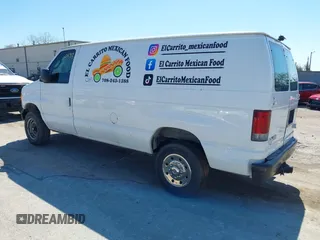 2004 Ford Econoline Cargo Commercial with VIN 1FTSE34P54HB35498, listed as a IAAI auction lot 41970490 with 155,186 mi miles. Bid and sale history available at carsss.com. Image 3.