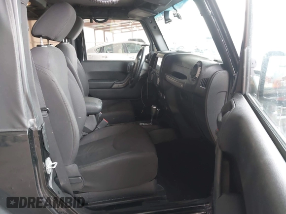 2015 Jeep Wrangler Sport with VIN 1C4AJWAG8FL550635, listed as a IAAI auction lot 42116285 with 111,782 mi miles. Bid and sale history available at carsss.com. Image 5.